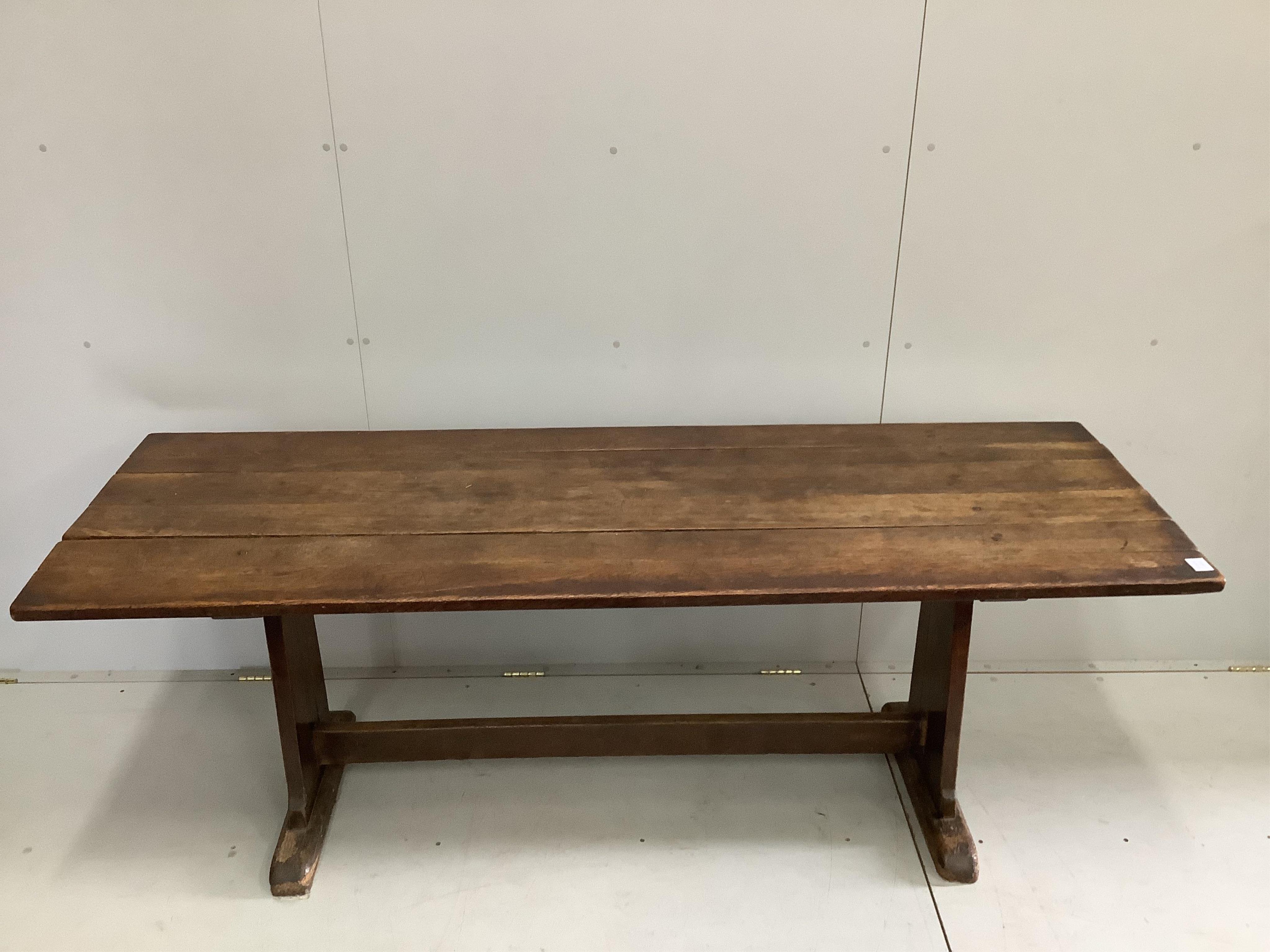 An 18th century and later rectangular oak tavern table, width 205cm, depth 69cm, height 76cm. Condition - fair